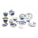 A collection of 18th century English blue and white soft paste porcelain items, to include a leaf