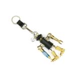 A Prada 'Robin' robot keychain (portachiavi), saffiano leather torso, metal drill bit arms and