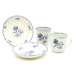A near pair of 18th century Worcester porcelain coffee cups and saucers, each decorated in the