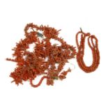 A single row graduated barrel shaped coral bead necklace, (requires re-stringing), together with two