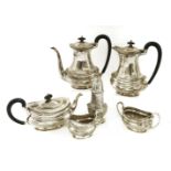 A Victorian four piece silver plated tea set, a cream jug and a sugar caster (6)Provenance: The