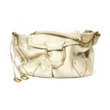 A Dolce and Gabbana cream leather handbag, with stitching detail to the front, gold-tone hardware