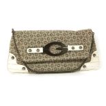 A Guess clutch handbag, woven double G fabric highlighted with a white crocodile effect leather,