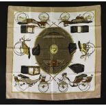 An Hermés silk scarf, 'Les Voitures a Transformation', designed by Francoise de la Perriere, cream