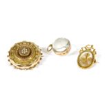 A Victorian gold split pearl brooch, a cluster of split pearls, star set to a raised boss with a