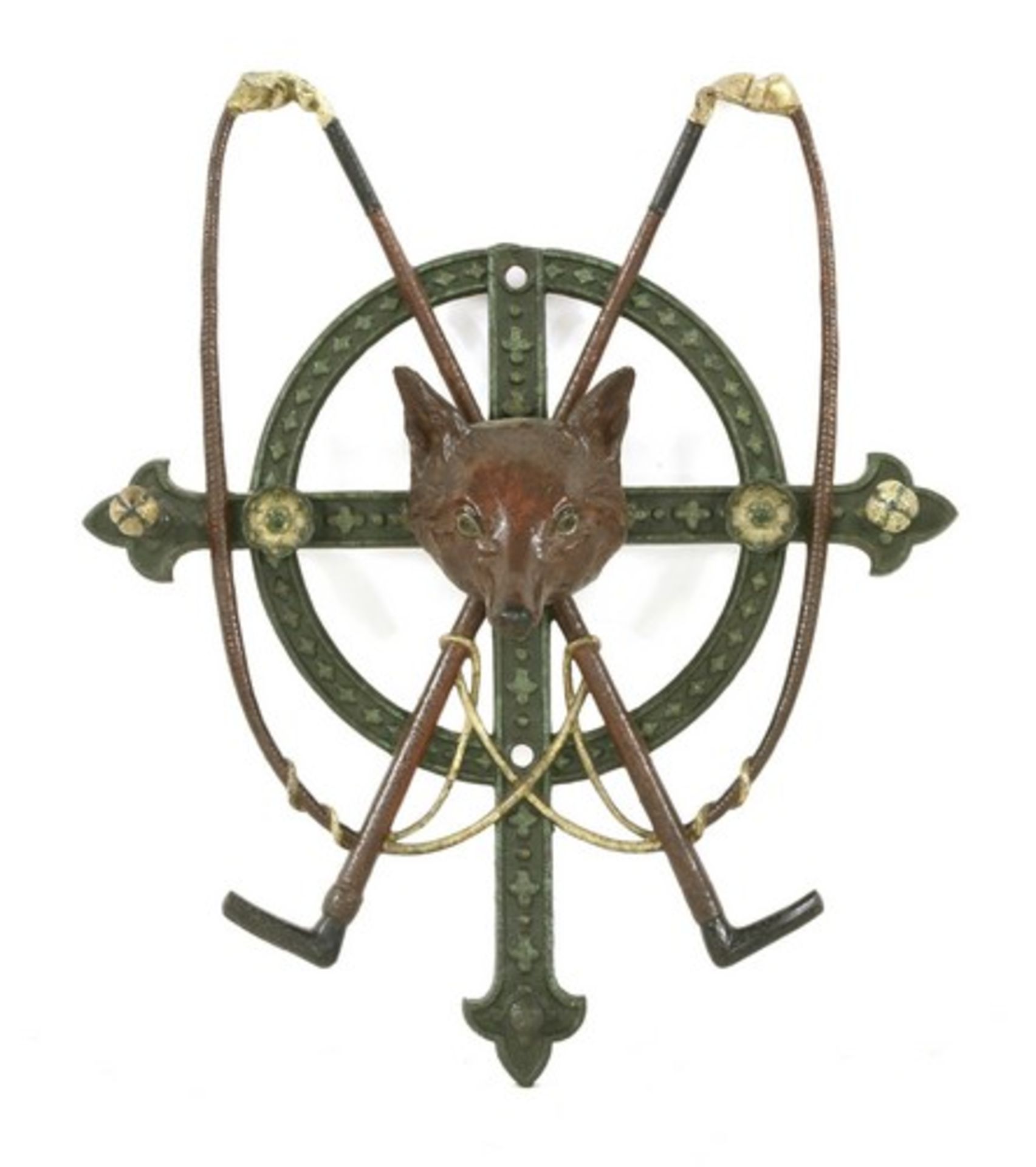 A cast iron wall hanging whip stand,