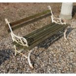 A white painted cast iron and teak garden bench