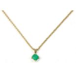 A single stone emerald cut emerald pendant