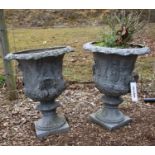 A pair of garden urns