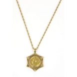 Half sovereign pendant