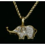 A two colour gold diamond set elephant pendant