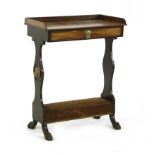 A 19th century mahogany sewing table, with galleried top and ebonised base, 61cm wide, 36cm deep,