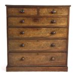 A Victorian walnut chest of two short and four long drawers