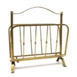 A brass magazine rack, Italian, c.1950, 40cm wide, 16.5cm deep, 42.5cm high