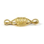 A gold naval crown and rope brooch,