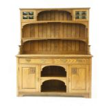 An Arts & Craft style oak dresser,