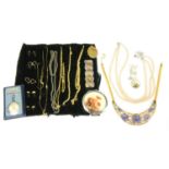 A large quantity of costume jewellery, to include a silver ingot, a blue past stone ring, gold