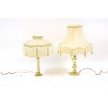 A quantity of lamps and light fittings , to include large brass column lamps, lanterns, shades etc