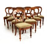 A set of ten Victorian mahogany balloon back chairs