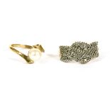 A 9ct gold pave set twisted ribbon design ring