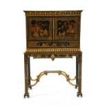 A chinese Chippendale style black lacquered chinoisserie cabinet on stand