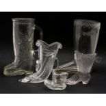 A large quantity of glass boots,
