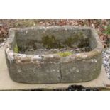 A York stone `D' shaped trough, 79 cm wide x 51 cm deep x 26 cm high