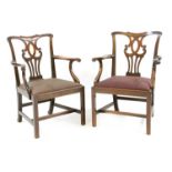 A pair of mahogany Chippendale style elbow chairs