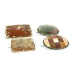 Four Victorian agate brooches, comprising a rolled gold rectangular moss agate brooch, a silver oval