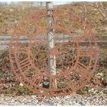 A pierced steel clock face with Roman numerals, 112 diameter