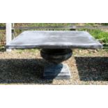 A large composite garden table