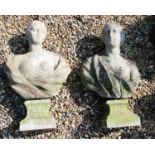 A pair of carved marble busts
