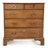 A George III oak chest of drawers