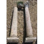 A set of four reconstituted stone garden pillars