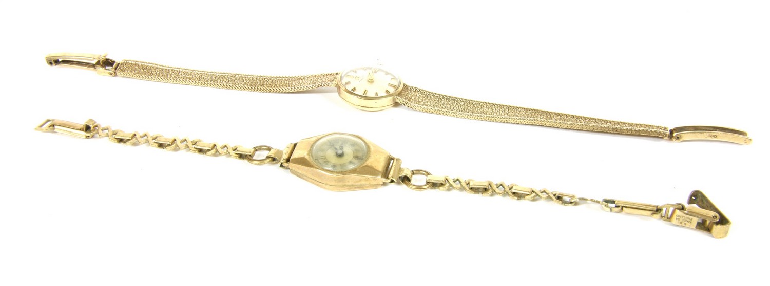 A ladies 9ct gold Tissot mechanical bracelet watch