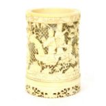 A Japanese carved ivory brush pot,