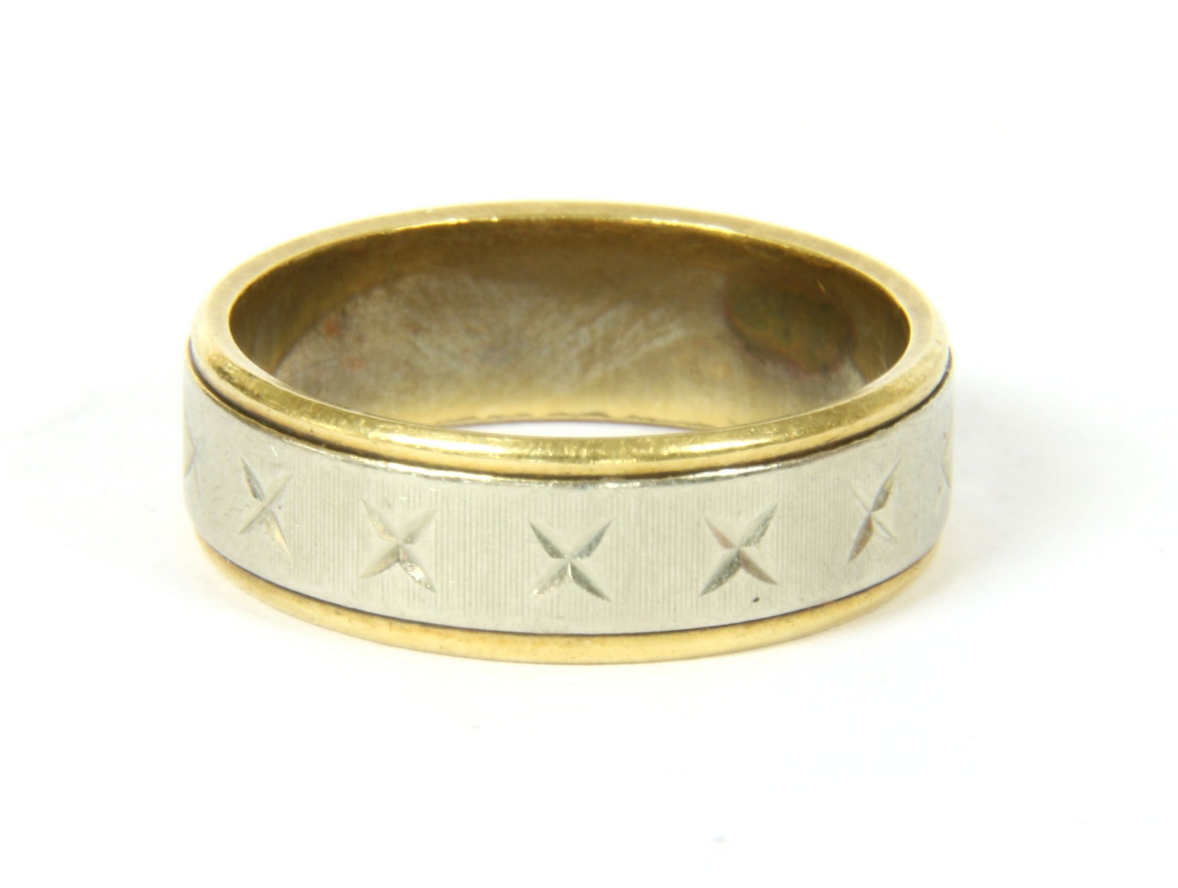 A two colour gold wedding ring