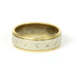 A two colour gold wedding ring