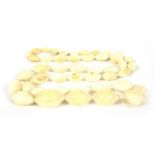 A single row 19th century graduated navette shaped ivory bead necklace