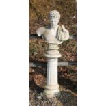 A white painted reconstituted stone bust of Caeser on fluted column