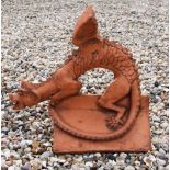 A terracotta roof ridge tile surmounted by a dragon, 44 high x 46 deep x 26 wide