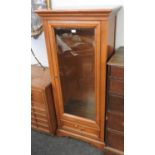 A mahogany display cabinet