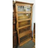 An oak five section Globe Wernicke stacking bookcase