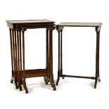 A nest of rosewood quartetto tables