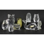 A collection of glass figures,