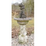 A marble fountain, surmounted with a boy with a fish on a dolphin stand, 129cm high