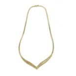 A three colour gold V-shaped necklace
