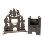 Two miniature cast iron fireplaces