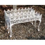 A pair of white painted aluminium plant stands,
