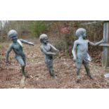 Three faux lead garden figures of young boys